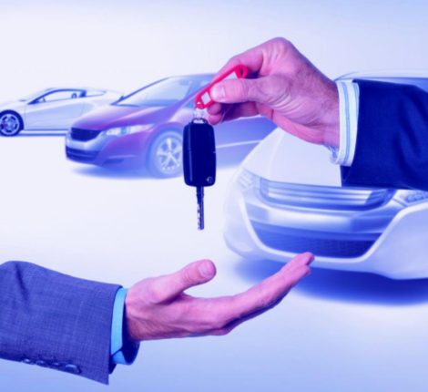 Car keys being exchanged, representing an auto refinance deal